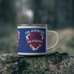 Blue enamel fishing mug with “I’m Hooked on Fishing” graphic, perfect for anglers and outdoor enthusiasts