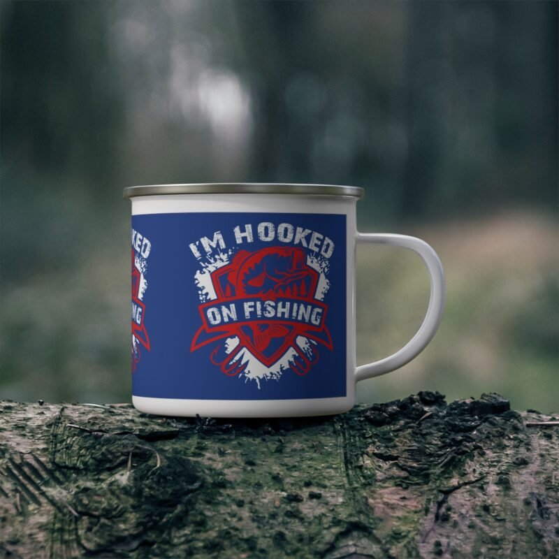 Blue enamel fishing mug with “I’m Hooked on Fishing” graphic, perfect for anglers and outdoor enthusiasts